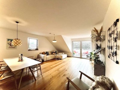 Schicke Dachgeschosswohnung mit Balkon und 2 TG -Stellplätzen