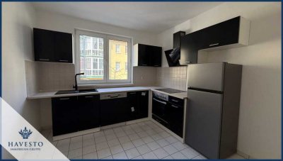 Attraktive Wohnung mit 2-Zimmern, neuer Einbauküche, Balkon & Stellplatz!