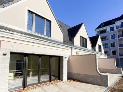 Modernes Townhouse auf vier Ebenen mit Studio, Hobbyraum & Garten *Bezug ab Januar 2026*