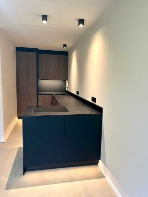 Elegante Garten Terrassenwohnung - Erstbezug -ruhig & grün- offene Küche- Büro/Gewerbe möglich