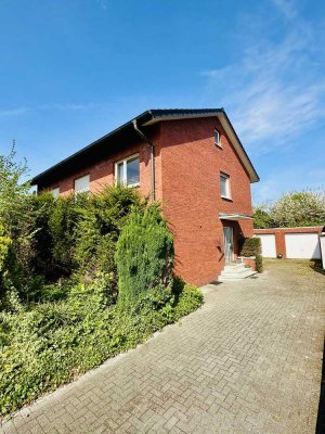 WERNE - Zweifamilienhaus mit Wintergarten und zwei Garagen
