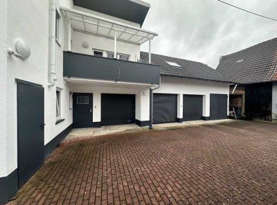 Moderne 4-Zimmer Wohnung mit Balkon, Doppelgarage und Hobbyraum