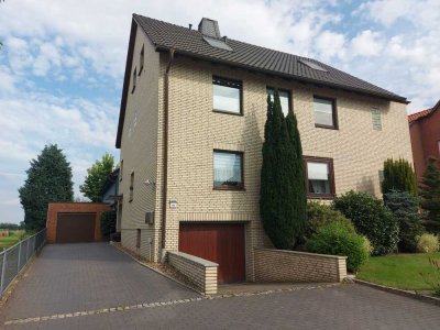 Vielseitiges Zweifamilienhaus mit Anbau: Ideal für Familien, Mehrgenerationen oder Gewerbetreibende