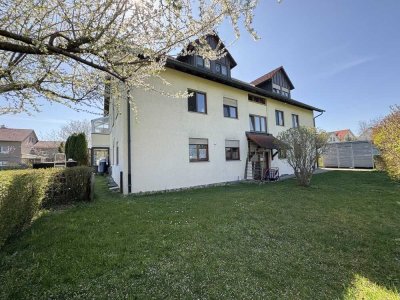 Wohnkomfort im Grünen: Erdgeschosswohnung mit Wintergarten, Garten & Garage in Bergatreute