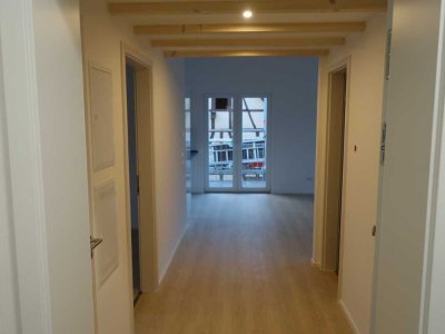 Lichtdurchflutete 3-Zimmer-Dachgeschosswohnung - Neubau mit toller Einbauküche