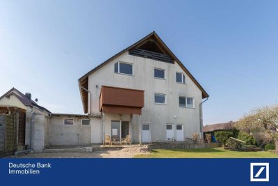 Erdgeschosswohnung mit genehmigtem Nutzungsänderungsantrag – mit Terrasse, Garage & Blick ins Grüne