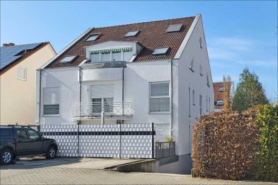 Lichtdurchflutete 2-Zimmer-Wohnung mit Terrasse, privatem Gartenanteil & TG-Stellplatz im Schälzig