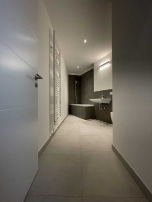 Moderne 4-Zimmer-Wohnung mit Gartenanteil und Gäste-WC
