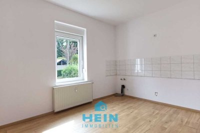 Freundliche 2-Raumwohnung mit Pkw-Stellplatz und eigenen Gartenanteil