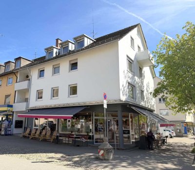 Attraktives Wohn- und Geschäftshaus direkt am Kirchplatz im Zentrum von Freiburg-Herdern