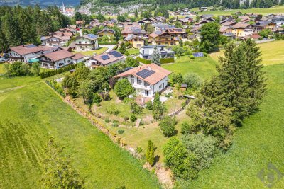 Bach, Biotop und viel Natur: Einfamilienhaus mit Einliegerwohnung und Erweiterungspotenzial in Adnet