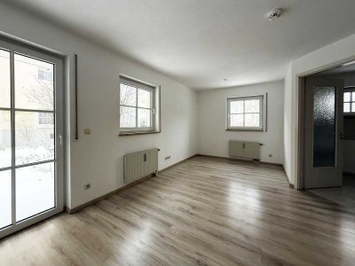 Ideal für Eigennutzer: ruhig gelegene 2 Zimmer-Wohnung in Leubnitz-Neuostra mit Gartennutzung