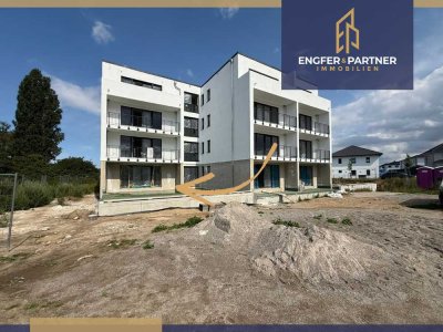 Hochwertige Neubau-Mietwohnung mit 4 Zimmern, Tiefgaragenstellplatz, Fahrstuhl und eigenen Garten!