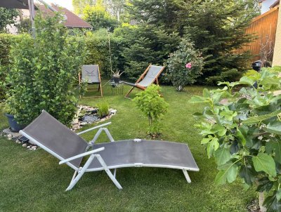 2-Familienhaus plus DG-Wohnung  mit schönem Garten und 3 Garagen