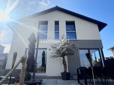 Modernes Architektenhaus in nachhaltiger Bauweise – Stilvolles Wohnen mit Blick ins Grüne!