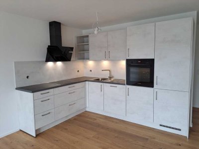 Neubau, 2,5 Zimmer, Erstbezug, ca. 61m², Balkon, EBK, Aufzug, TG