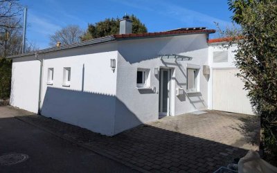 Bungalow in gefragter Wohnlage mit großzügiger Terrasse und Wintergarten