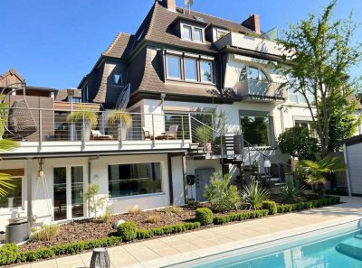 "Haus im Haus Konzept“ saniert, mit 3 Terrassen und traumhafter Wellness-Oase.