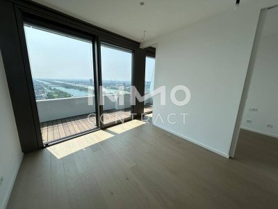 2 Zimmer Erstbezug mit atemberaubenden Blick auf die Donau! Pool, Sauna, Gym inklusive!