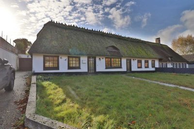 Reetdachkate in Flensburg – Sanierungsobjekt mit Einliegerwohnung