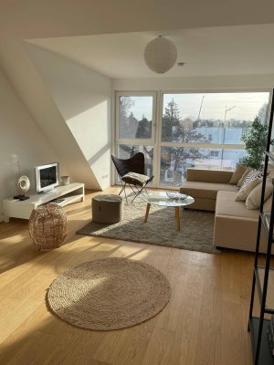 2 Zimmer Dachgeschosswohnung mit ruhiger Terrasse und Pool im Garten