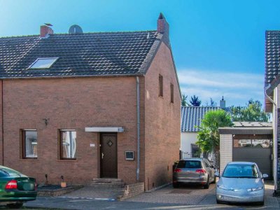 Laufend modernisierte Doppelhaushälfte mit rückwärtigem Bungalow in Giesenkirchen