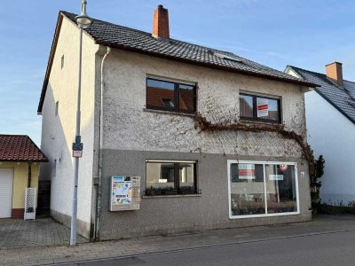 Vielseitiges 1-2 Familienhaus mit schönem Garten, großer Garage und kleiner Gewerbeinheit