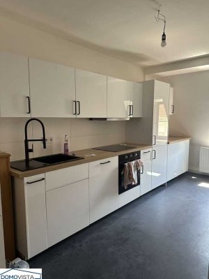 Bezugsfrei Familienwohnung mit Stellplatz & Einbauküche in zentraler Lage