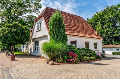 Attraktives Dreiparteienhaus mit zusätzlichem Baugrundstück – vielseitige Investitionsmöglichkeit