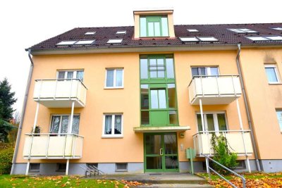 Attraktive Kapitalanlage: Vermietete EG-Wohnung mit Balkon, Bad mit Wanne/Dusche & TG-Stellplatz