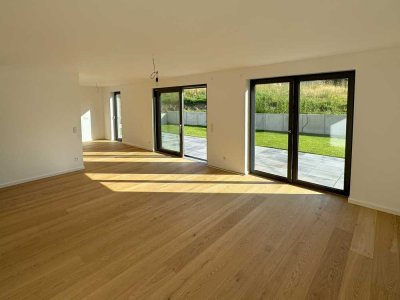 Moderne Eigentumswohnung im Erdgeschoss mit sonnigem Garten und Terrasse