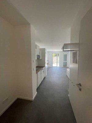 ERSTBEZUG: Moderne, möblierte und barrierefreie 1-Zimmer-Wohnung mit Südterrasse & TG-Stellplatz