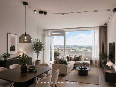 WOHNEN ÜBER DEN DÄCHERN DER STADT – helle 2-Zimmerwohnung mit EBK, TG-Stellplatz und Loggia