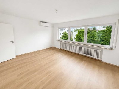 Sanierte 4-Zimmer-Wohnung mit Balkon, Klimaanlage und zwei Garagen