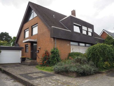 Einfamilienhaus mit Einliegerwohnung, Garage und Garten in Salzbergen