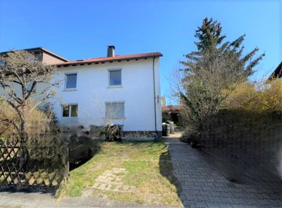 Ruhig gelegenes 2-Familienhaus mit Garage, Stellplätzen & Gartenlaube-Erweiterungspotential gegeben