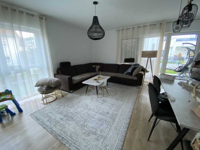 Geschmackvolle 3-Raum-Erdgeschosswohnung mit Einbauküche, Terrasse und Garten in Nidderau