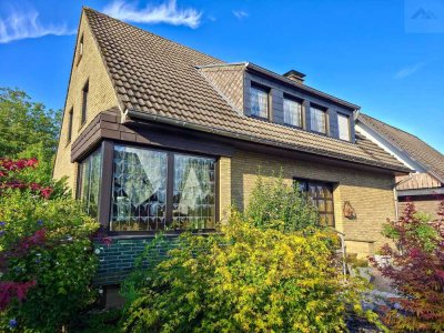 Wo Raum auf Ruhe trifft – freistehendes Einfamilienhaus mit Wintergarten