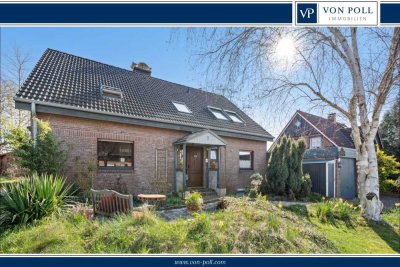 Tolles Zweifamilienhaus mit großem Grundstück und Blick ins Grüne!
