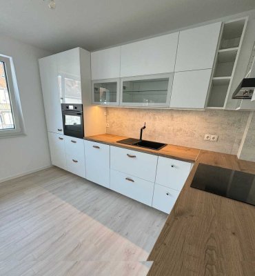 Helle moderne 3-Zimmer-Neubauwohnung mit Balkon, Einbauküche und Tiefgarage in Neustadt