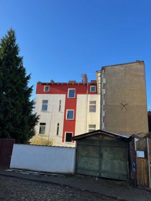 Mehrfamilienhaus und Neubaufläche im Sanierungsgebiet - MD Salbke