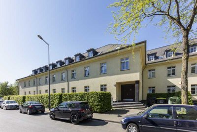helle 2 Zimmerwohnung mit Sonnenbalkon im historischen Gebäudekomplex am König-Baudouin-Platz