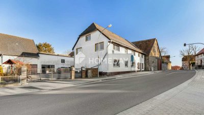 Zweifamilienhaus mit Gewerbeeinheit, großzügigem Grundstück und massivem Nebengebäude