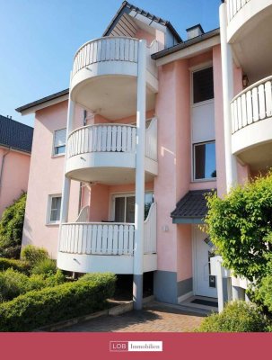 Die Lichtdurchflutete Dachgeschosswohnung mit Süd-Balkon – Wohngenuss über den Dächern