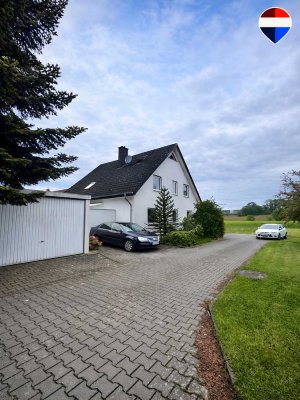 Familientraum in Sackgassenlage – Großzügiges Zweifamilienhaus mit Garten & Feldblick!