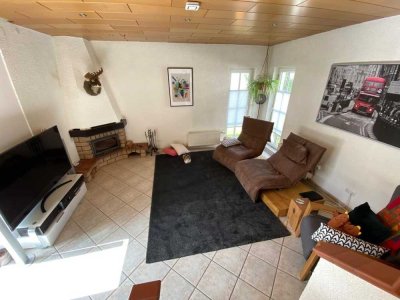 Zentral gelegene Wohnung mit großen Terassen, Garten und Außensauna