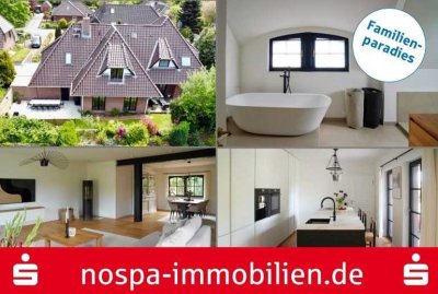 Umfassend und hochwertig saniertes Einfamilienhaus mit massiver Garage, Carport  und 2 Terrassen