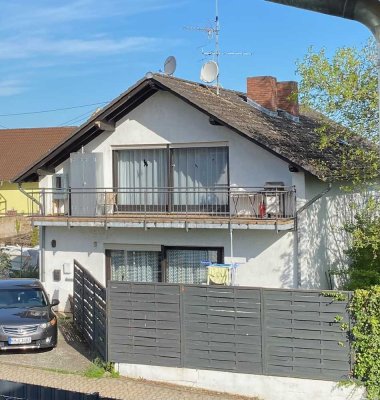 Mehrfamilienhaus mit Lagerhalle in KH-Bosenheim