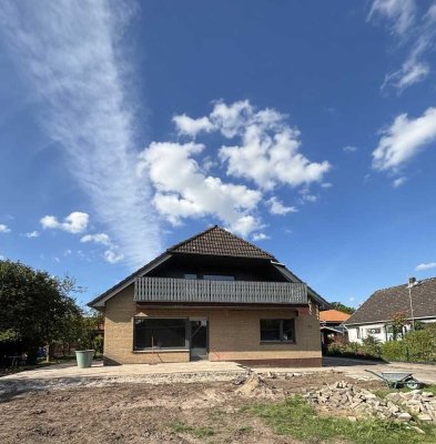 Erstbezug nach Sanierung: 5-Zimmer-Einfamilienhaus in Ovelgönne mit Kamin  und Garten