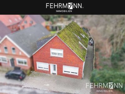 Zentral gelegenes Zweifamilienhaus mit geräumigem Garten in Weener zum Kauf